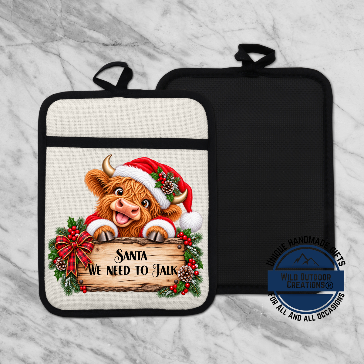 A kitchen pot holder with a cartoon cow wearing a Santa hat and holding a sign that says "Santa we need to talk".