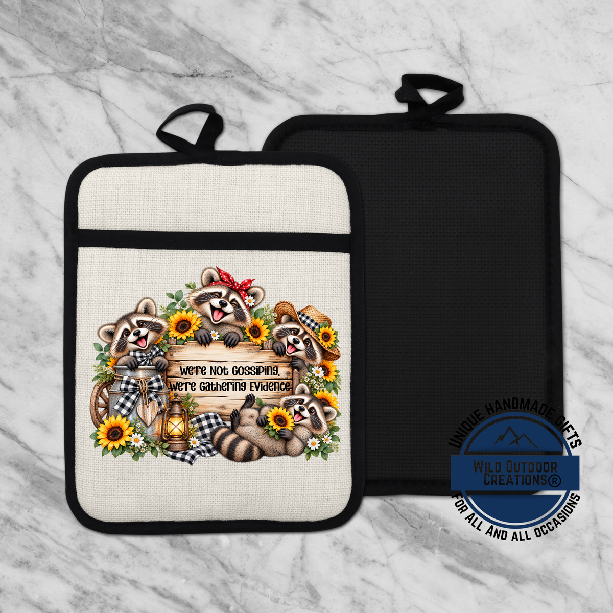a kitchen pot holder with a design of raccoons and sunflowers.
