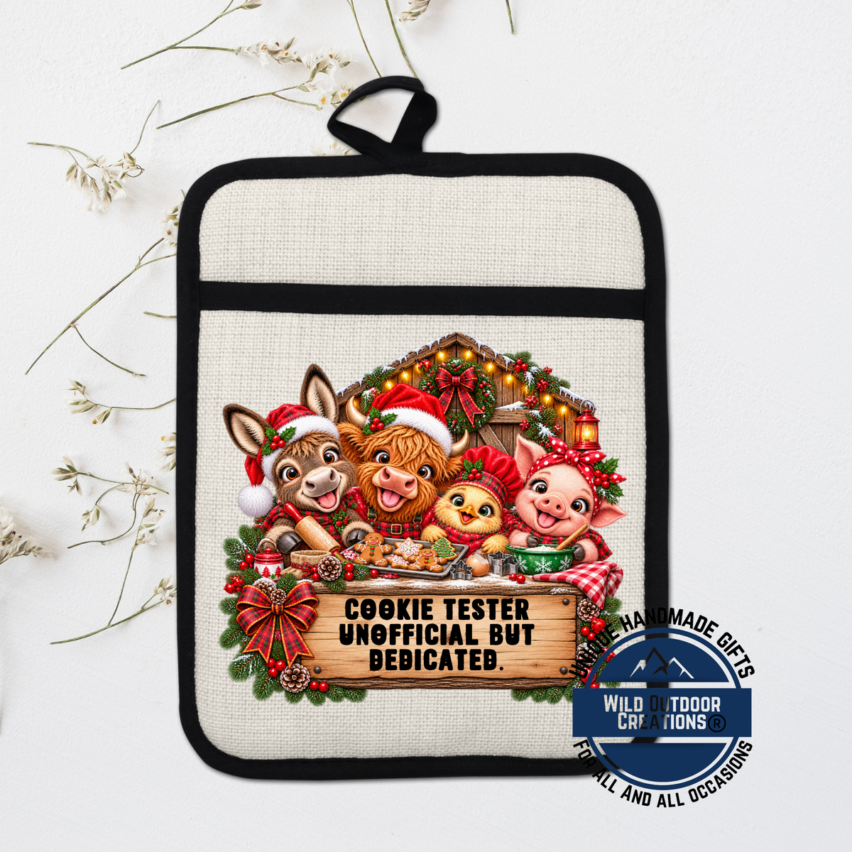 A hand-made gift with a Christmas-themed design, featuring a cookie tester character surrounded by various animals and holiday decorations.