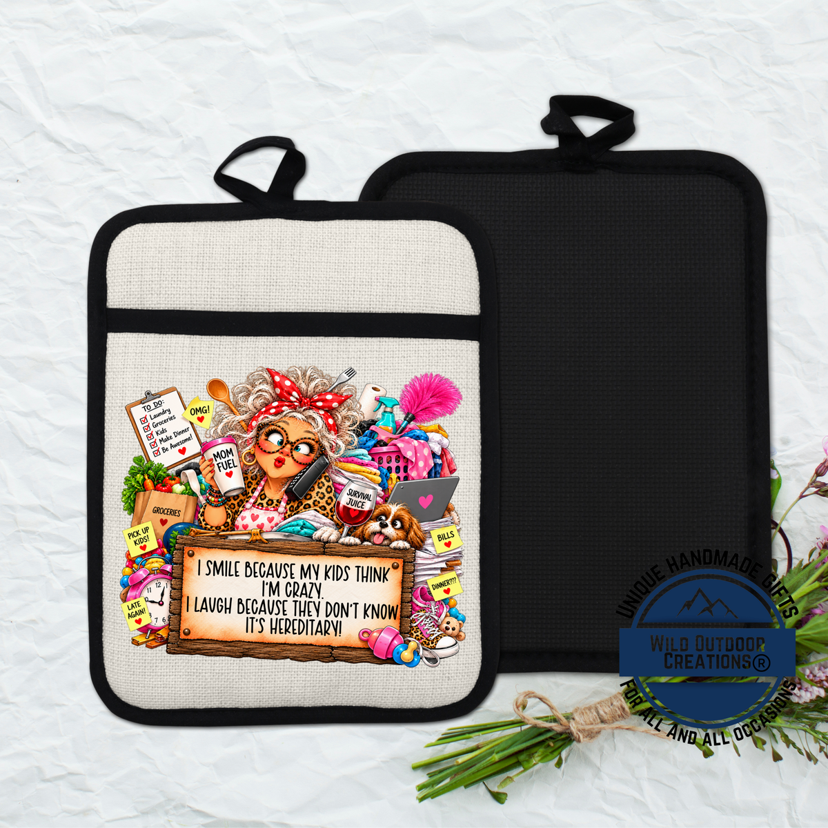 A hand-painted pot holder featuring an illustration of an elderly woman with a humorous caption that reads "I smile because my kids think I'm crazy, I laugh because I don't know it'sheredary!"