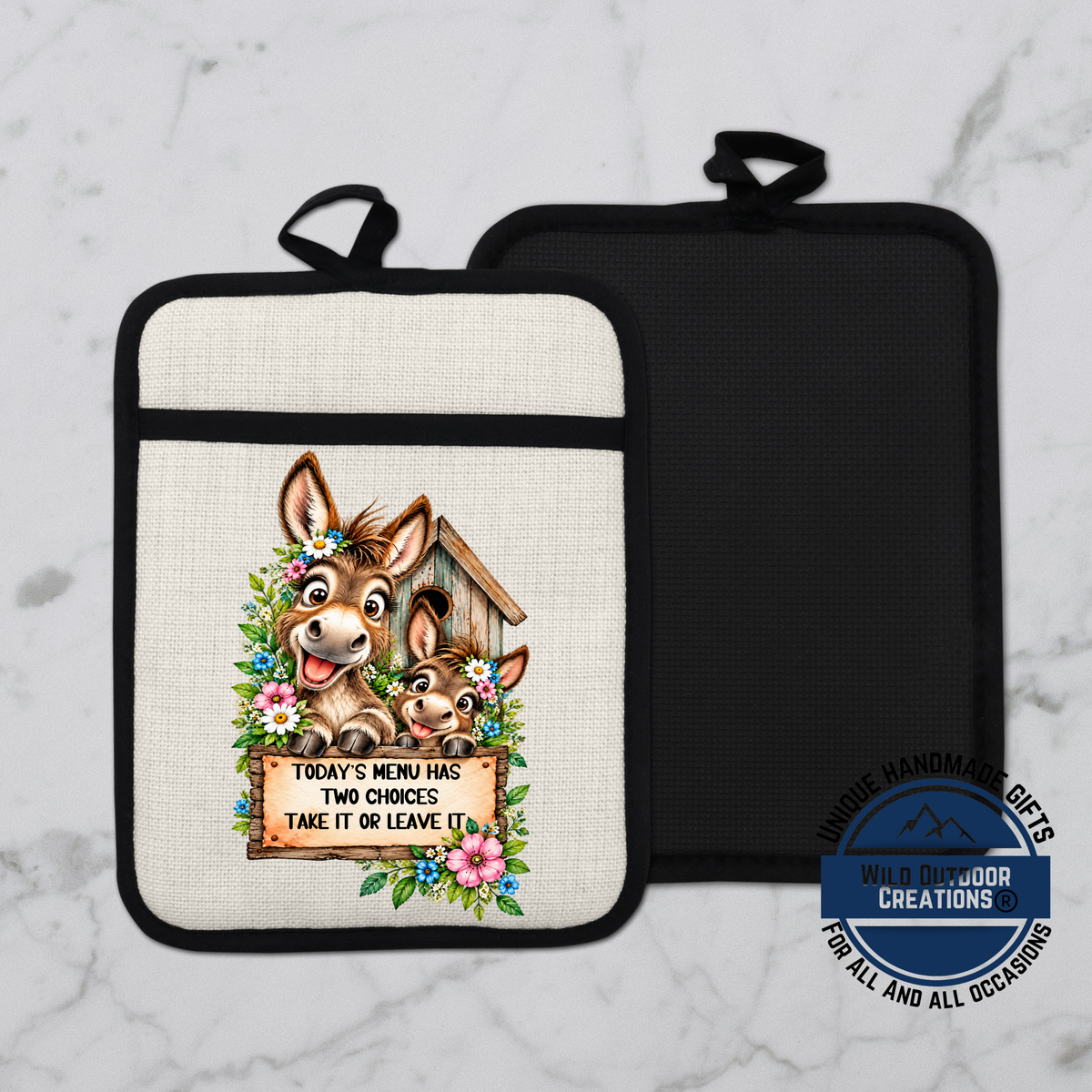 a kitchen pot holder with a cartoon donkey and a sign that says "Today's menu has two choices take it or leave it".