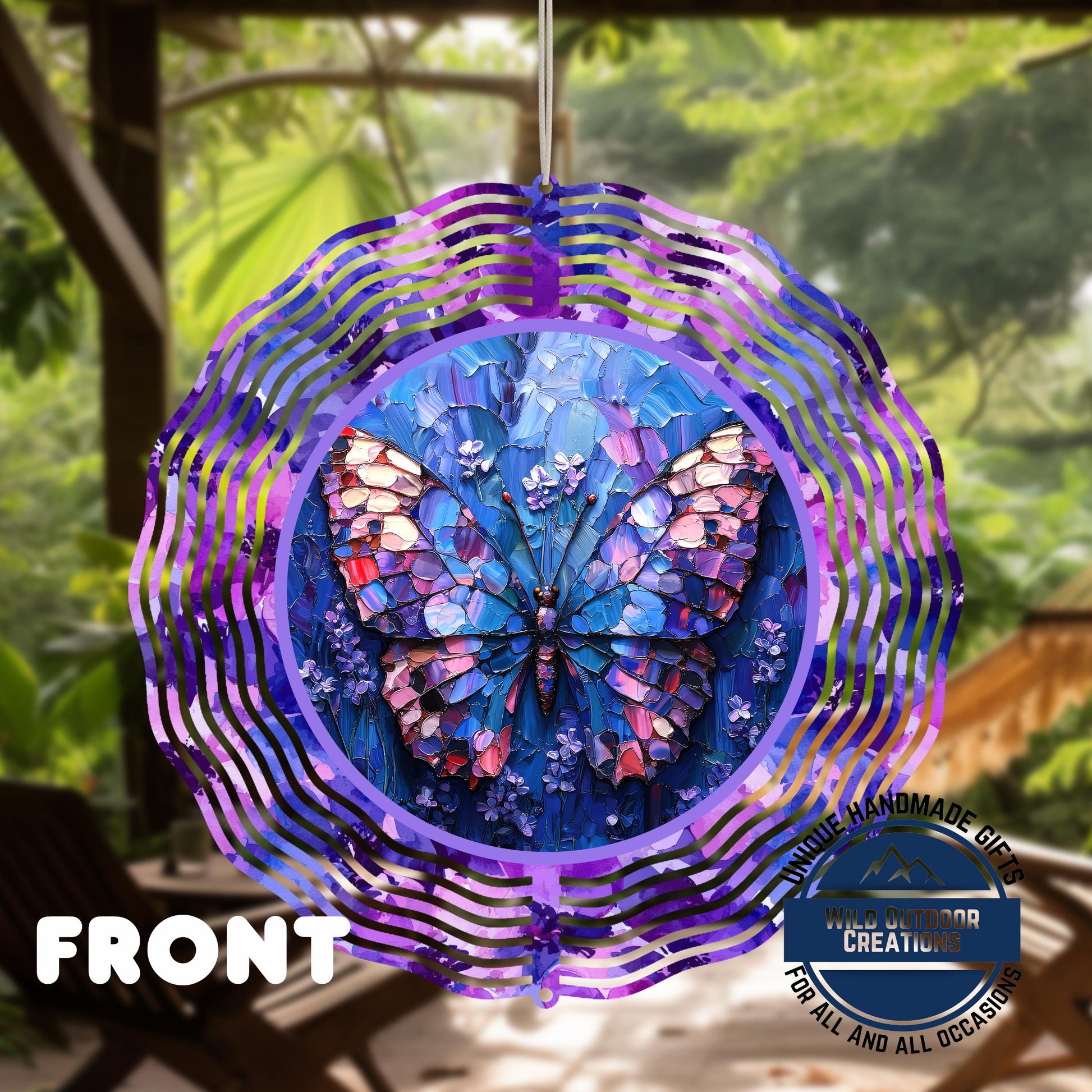 Butterfly Wind Spinner - Double Sided Mosaic Style Spinner, Purple Blue, 10 Inch Aluminum - shown spinning in outdoor gard...