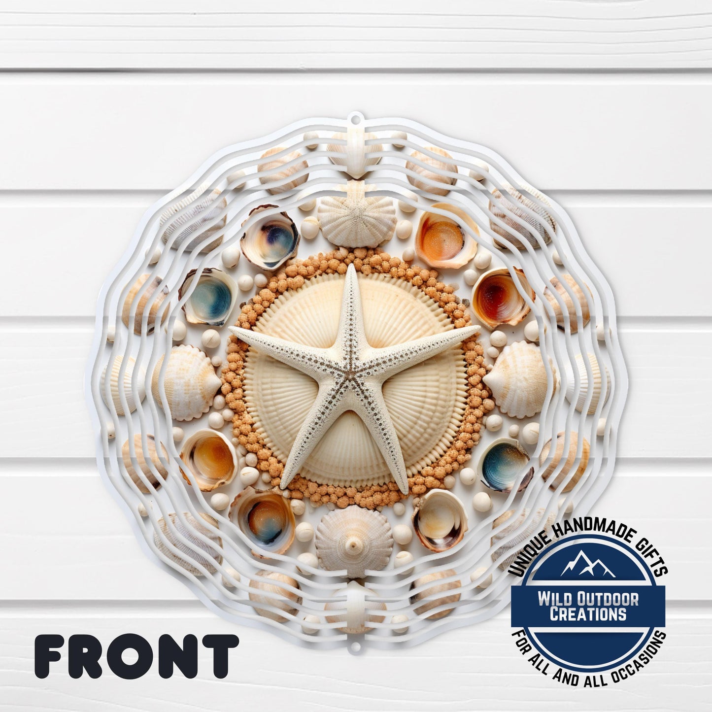 Coastal Seashell Wind Spinner - Aluminum Beach Nautical Yard Art, 10 Inch - shown spinning in outdoor garden setting