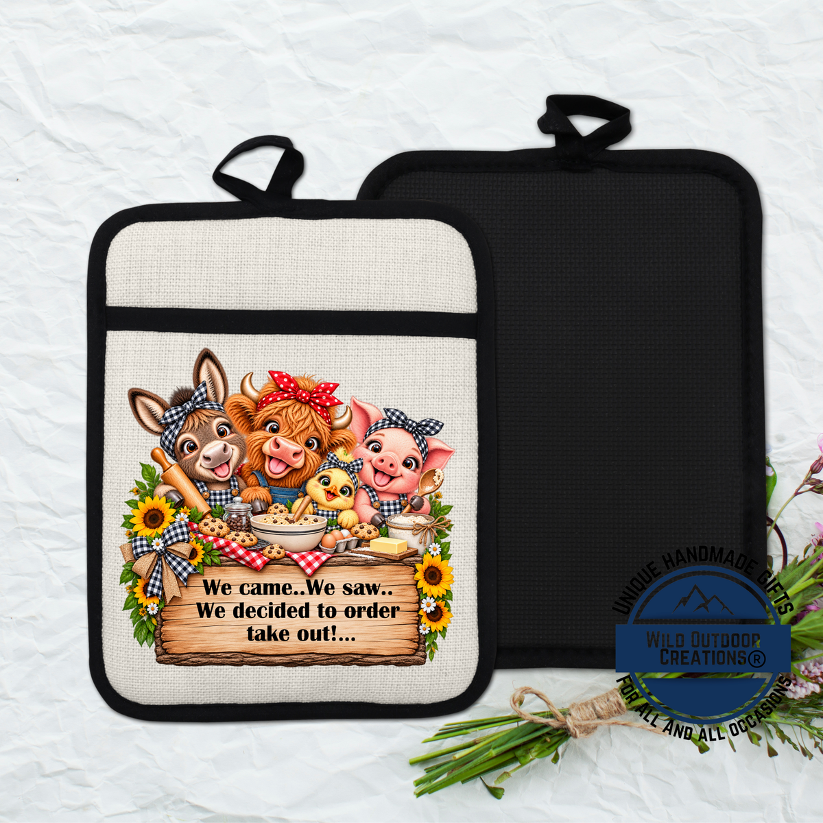A printed pot holder with a cartoon illustration of farm animals, including a cow, pig, and chicken, along with a wooden sign that says "We came. We saw. we decided to order take out...".