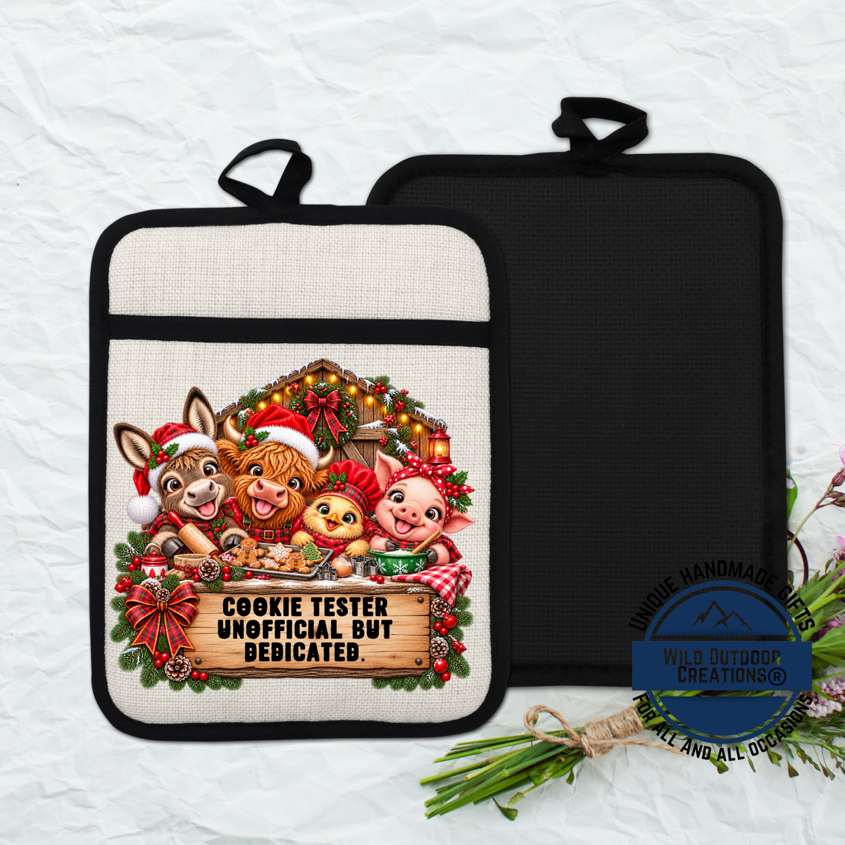 A printed pot holder with a cartoon image of a group of animals, including a cow, pig, and chicken, along with a sign that says "Cookie Tester Unofficial But Dedicated".