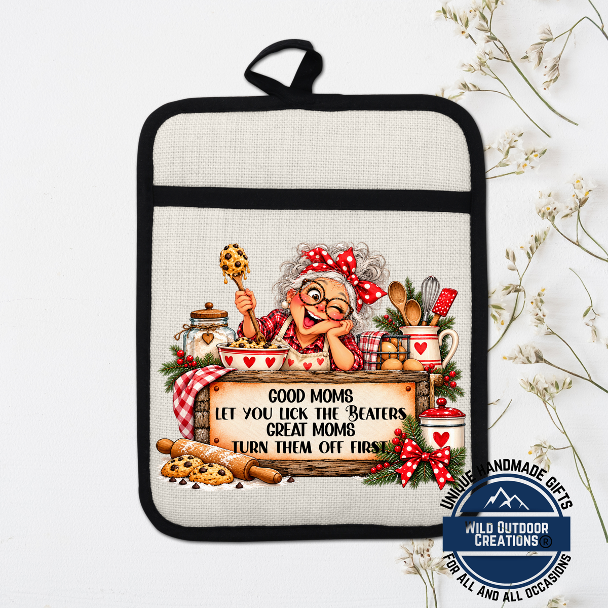 A hand-painted pot holder featuring an illustration of an elderly woman cooking, surrounded by various kitchen items and text.