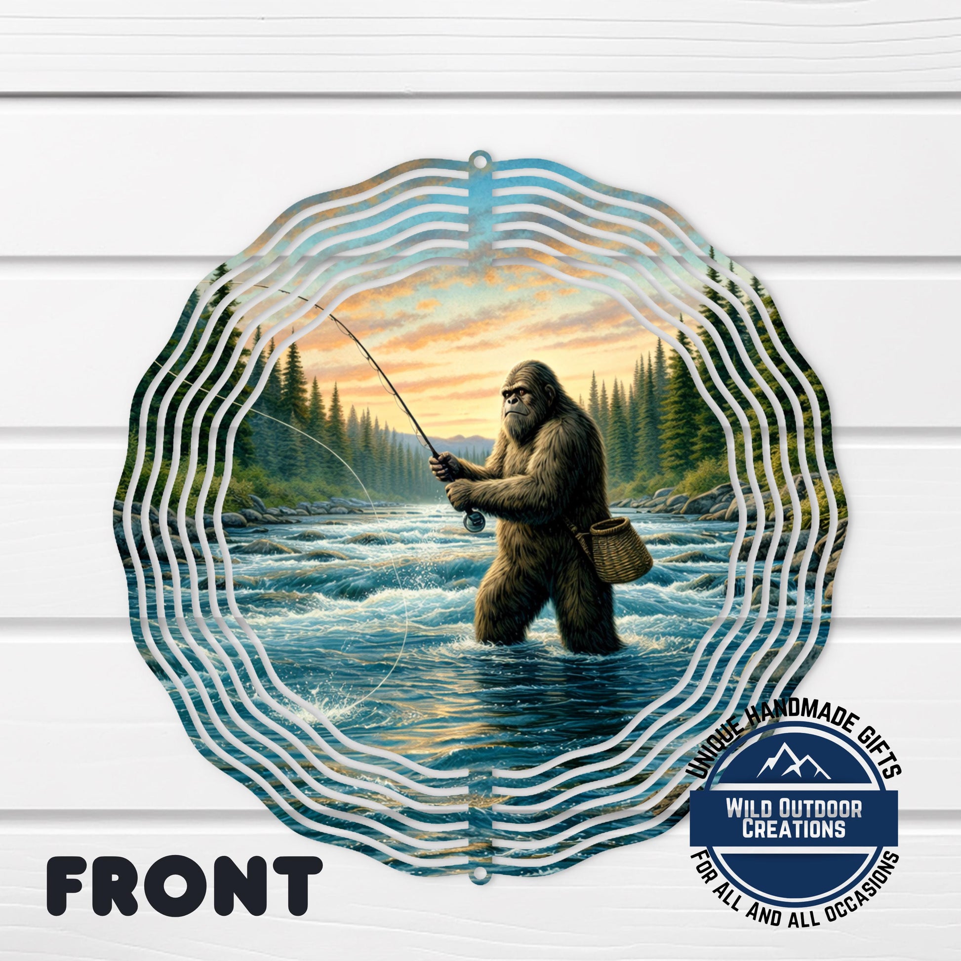 A large, circular metal decoration featuring a depiction of a giant, furry creature fishing in a river, surrounded by a wavy, repeating pattern.