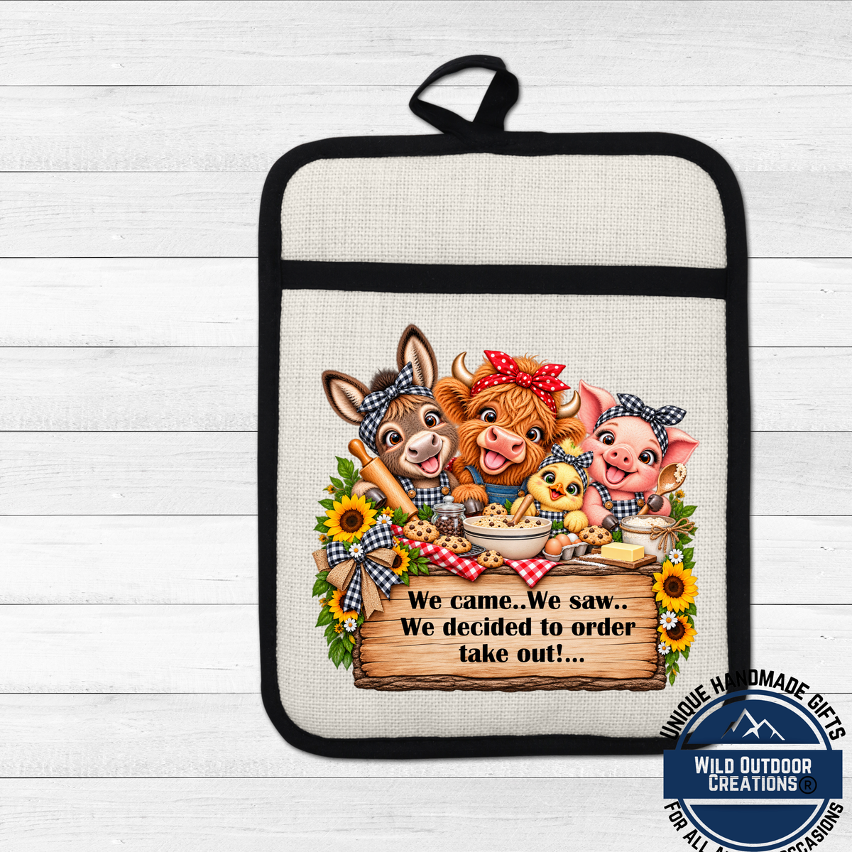 A kitchen pot holder with a cartoon illustration of farm animals, including a cow, pig, chicken, and duck, along with a sign that says "We came. We saw. We decided to order take out!".