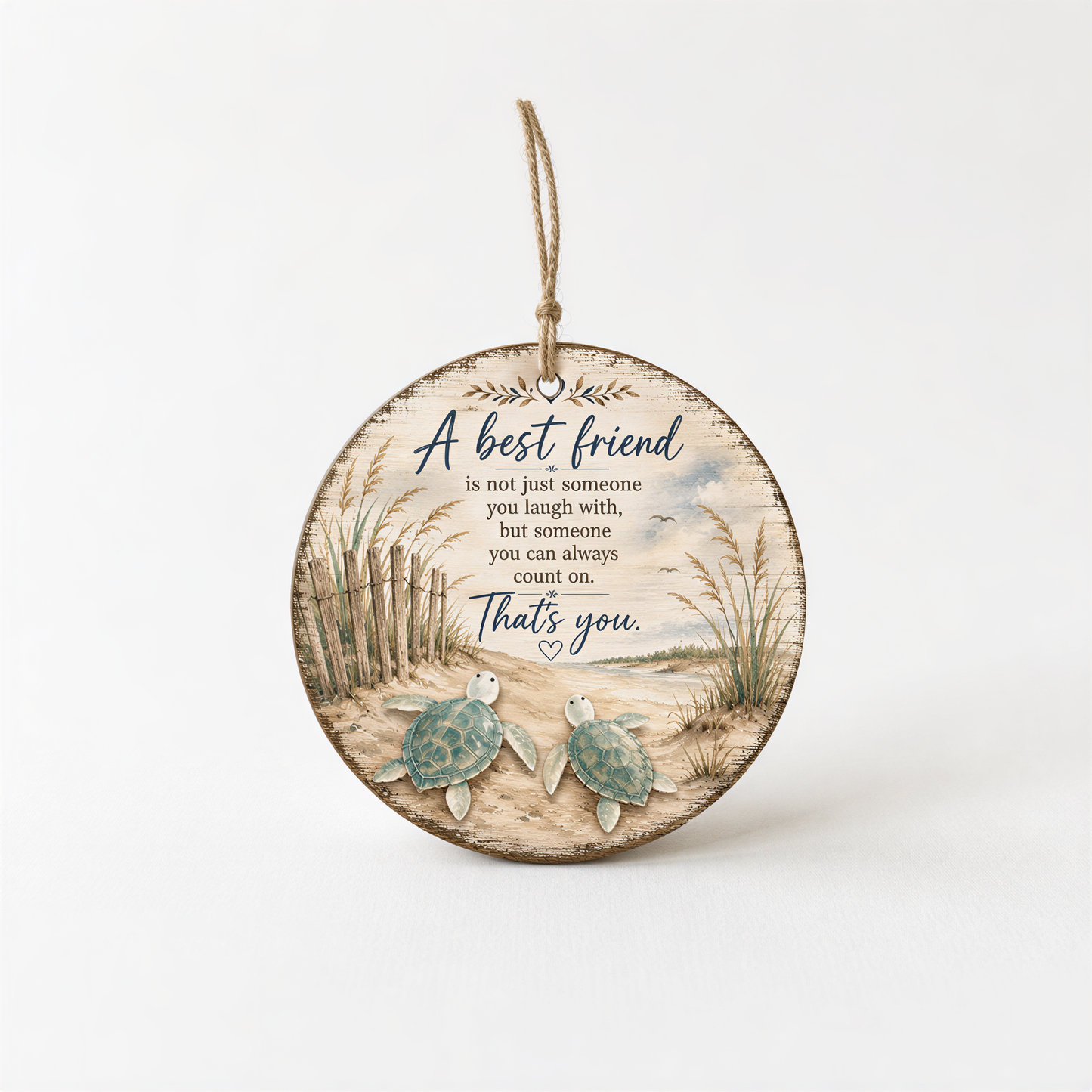 A wooden ornament with a beach scene and two turtles, accompanied by a message about the value of true friends.