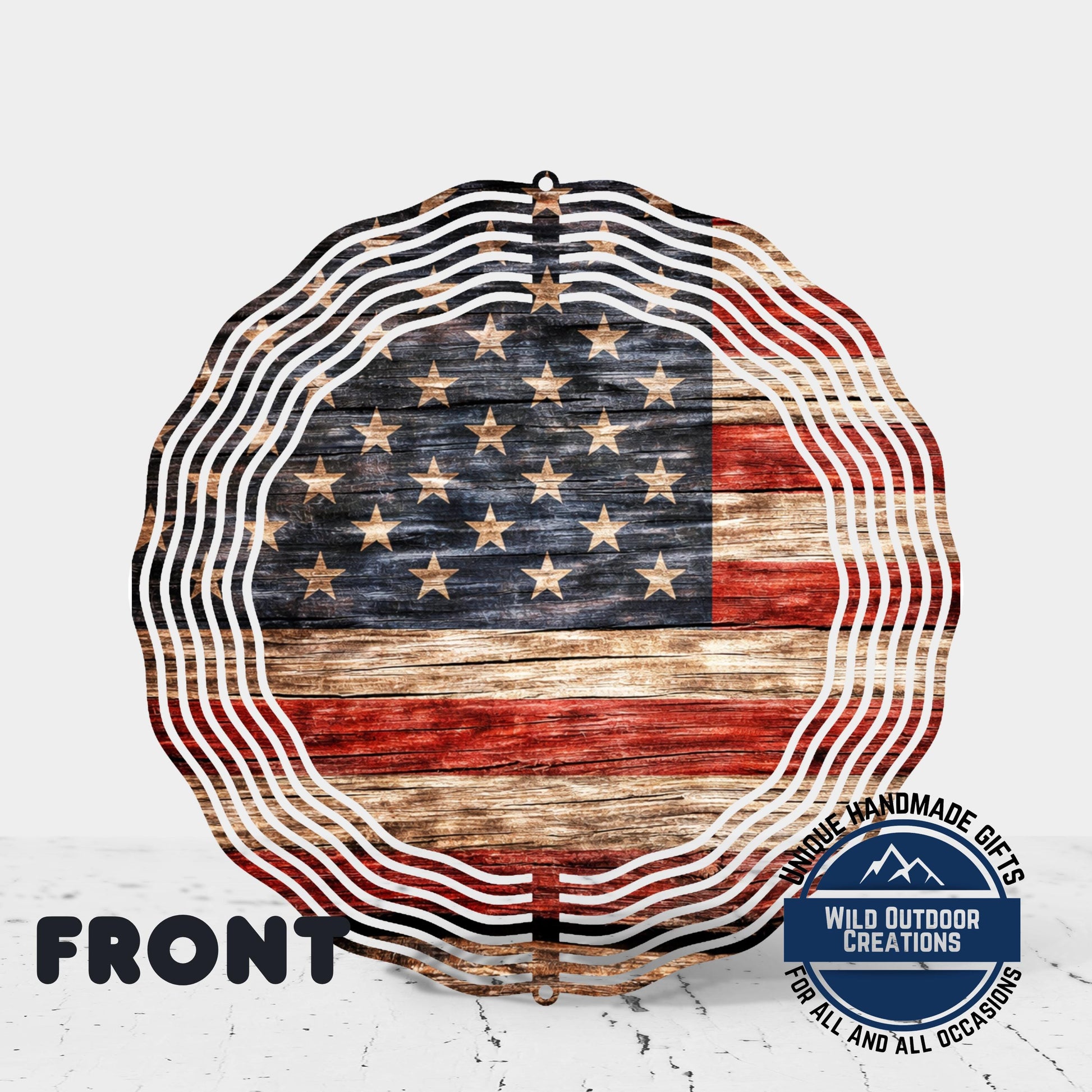 a large American flag-themed decoration with a wooden texture and a wavy border design.