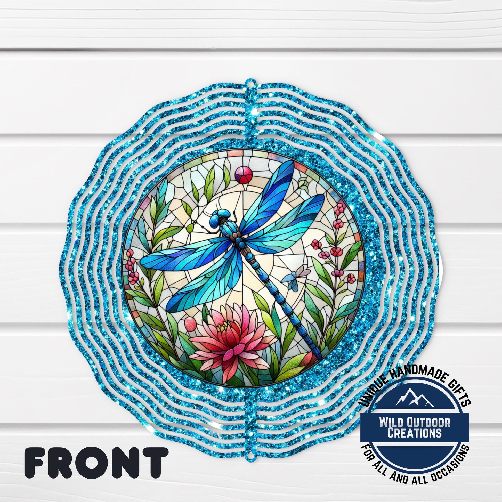 Dragonfly Wind Spinner - Vibrant Faux Glitter Stained Glass Garden Decor - shown spinning in outdoor garden setting