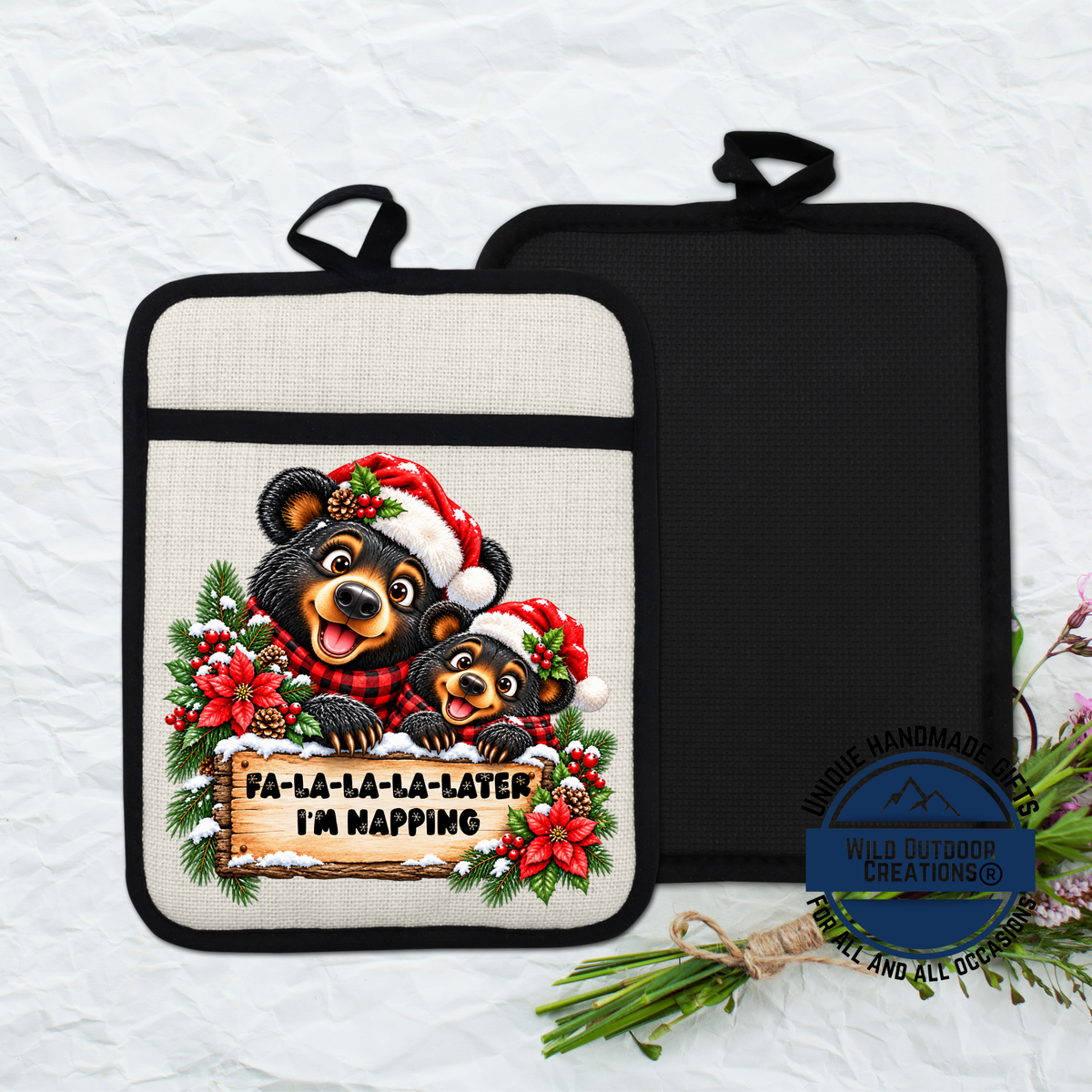 A beaver wearing a Santa hat and scarf is depicted on a pot holder with a sign that says " Fa-la-la-la-later I'm napping".