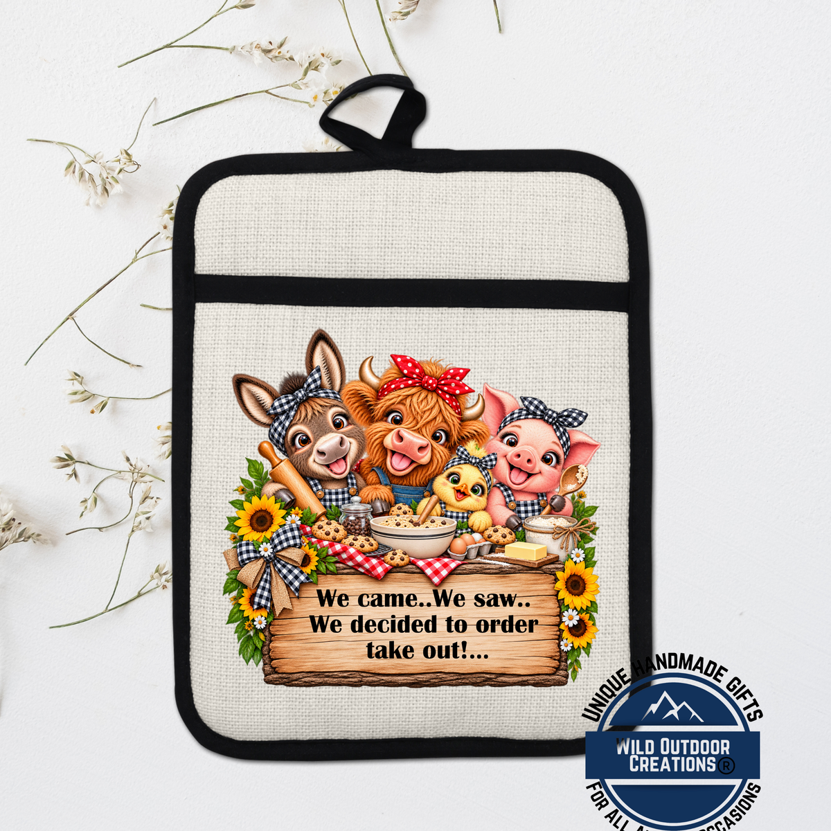 A kitchen pot holder with a cartoon illustration of farm animals, including a donkey, cow, pig, and chicken, along with a sign that says "We came. We saw. We decided to order take out...".