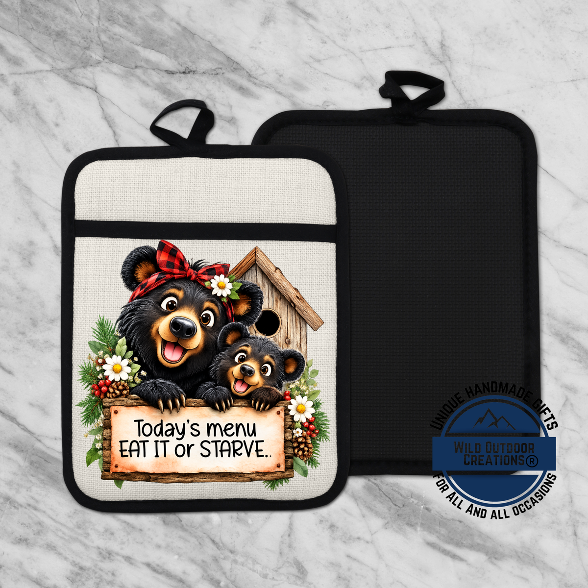 A kitchen pot holder with a cartoon image of two bears, one larger and one smaller, sitting in a birdhouse and holding a sign that says "Today's menu eat it or starve".