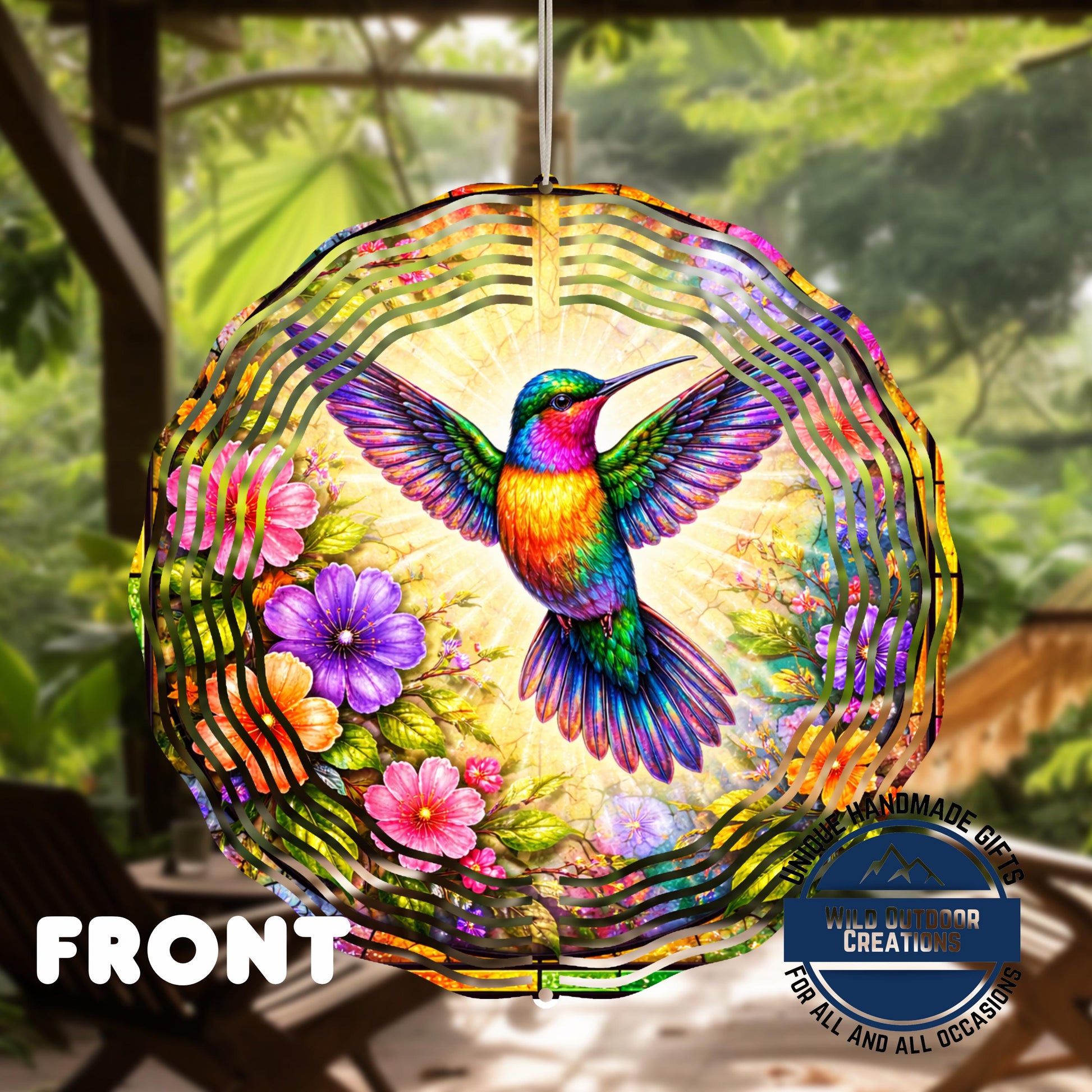 Hummingbird Garden Spinner - Double Sided 10" Floral Wind Spinner with Smooth 360 Rotation - shown spinning in outdoor gar...
