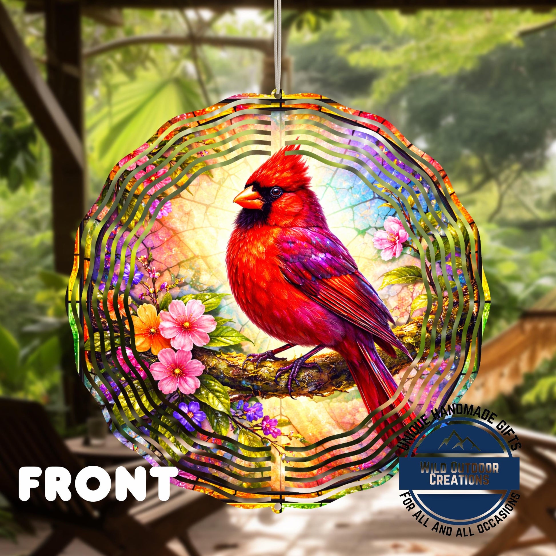 Cardinal Wind Spinner - 10 Inch Aluminum Outdoor Garden Decor With Pink Yellow Flowers - shown spinning in outdoor garden ...