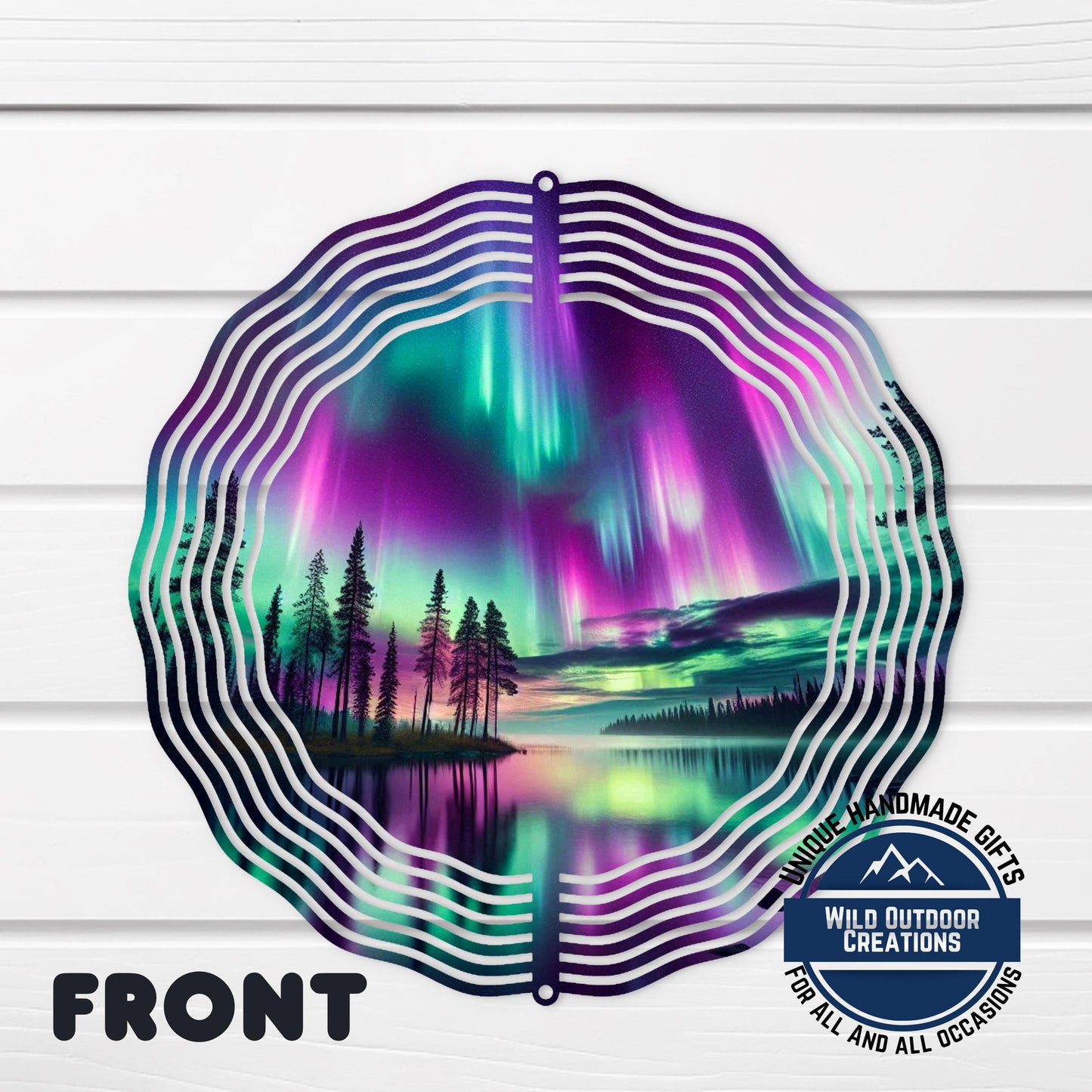 Northern Lights Wind Spinner - 10 Inch Double Sided Lake Scene Garden Decor - shown spinning in outdoor garden setting