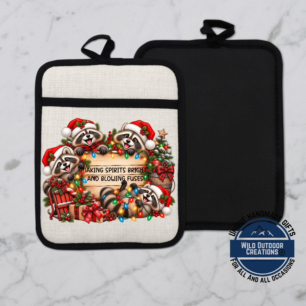 A white and black pot holder with a festive Christmas-themed design featuring raccoons wearing Santa hats and surrounded by holiday decorations.