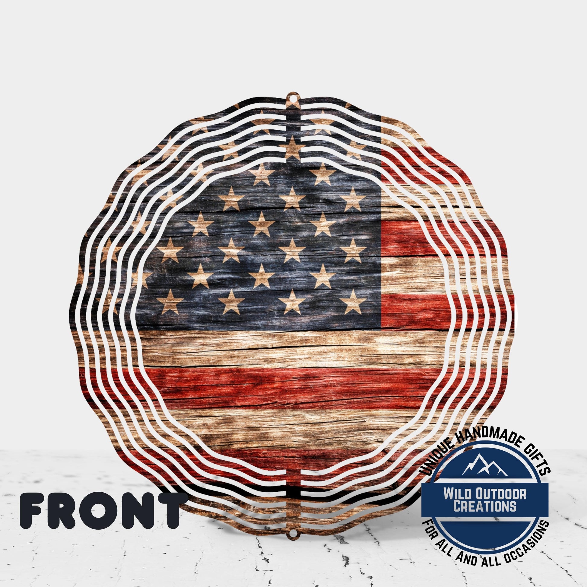 a large American flag-themed decoration with a distressed, weathered appearance.