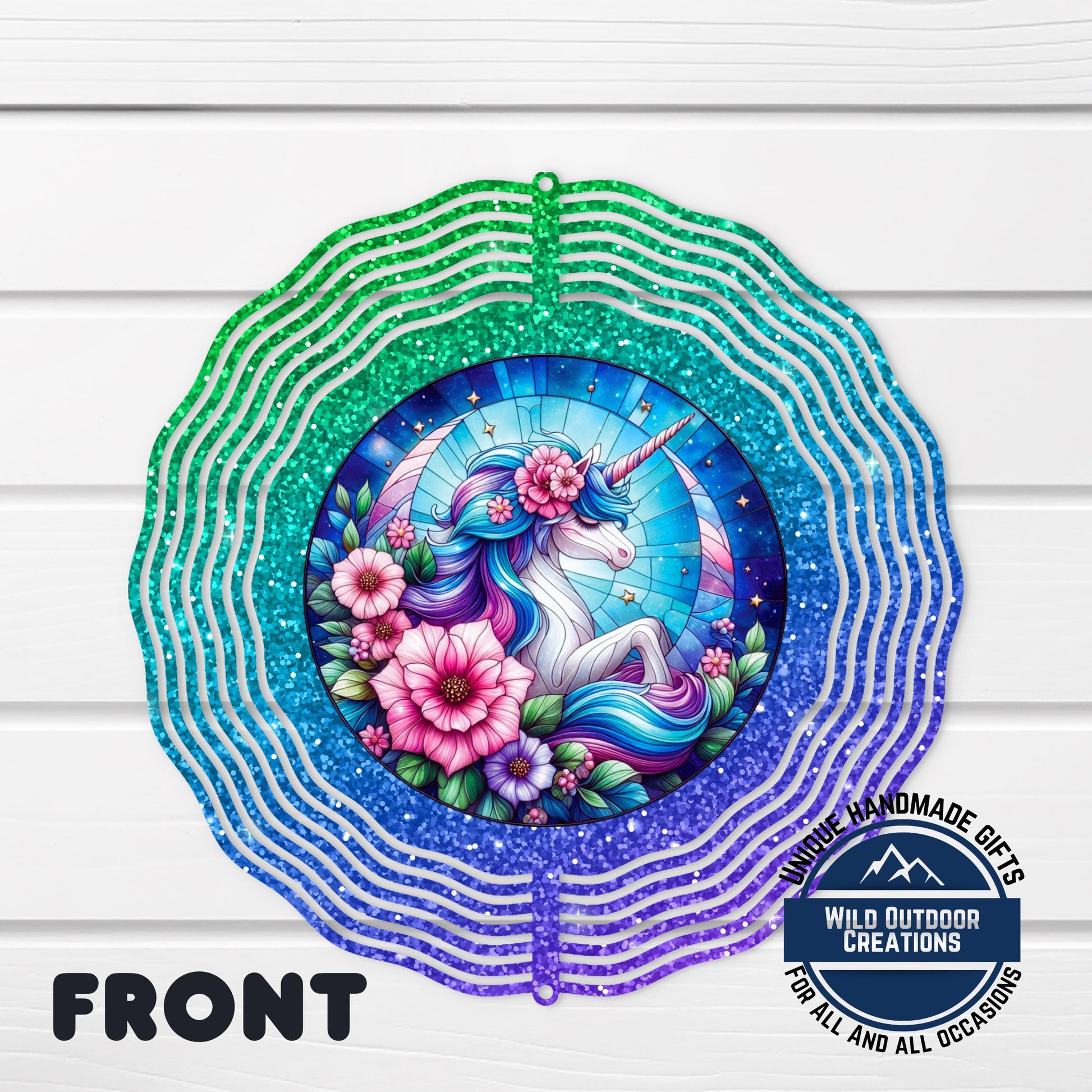 Unicorn Wind Spinner - Double Sided Glitter Ombre 10 Inch Outdoor Decor - shown spinning in outdoor garden setting