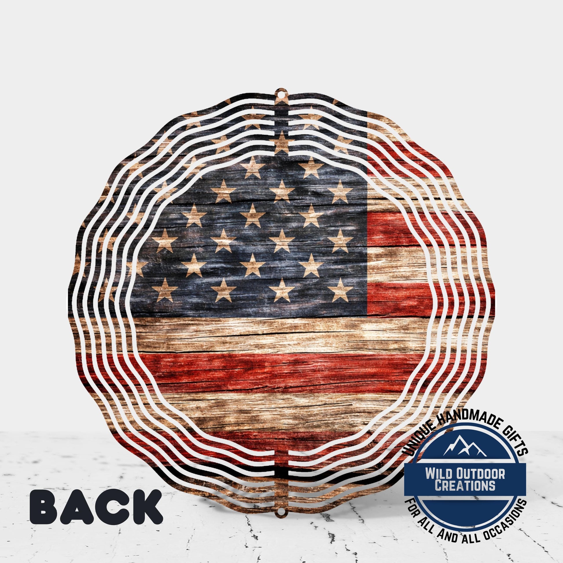a large American flag-themed decoration with a wavy, rustic appearance.