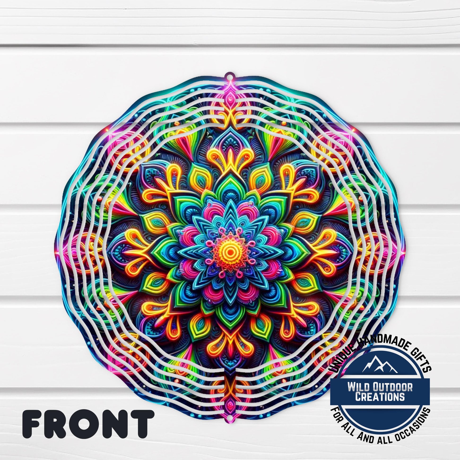 Neon Mandala Wind Spinner - 10 Inch Aluminum Outdoor Wind Spinner with Vibrant Neon Colors - shown spinning in outdoor gar...