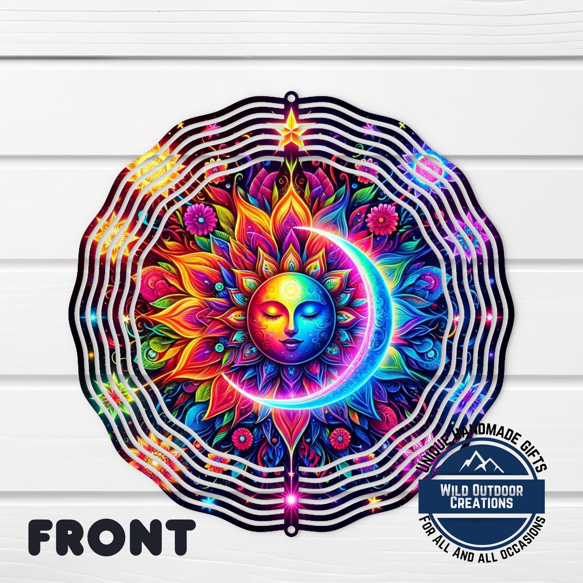 Celestial Wind Spinner - Neon Sun Moon Design | Double Sided Aluminum Spinner - shown spinning in outdoor garden setting